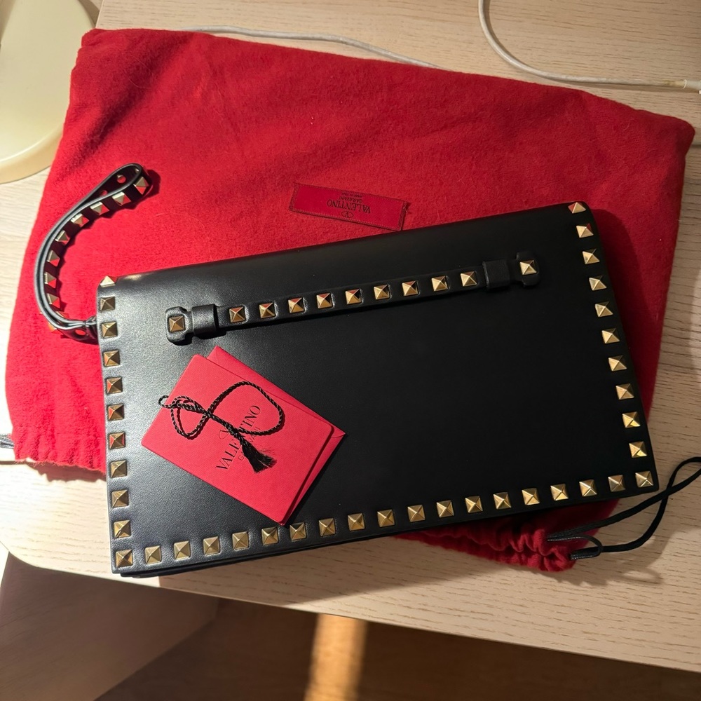 Valentino
Black Leather Rockstud Mini Crossbody Clutch
From Selfridges.com